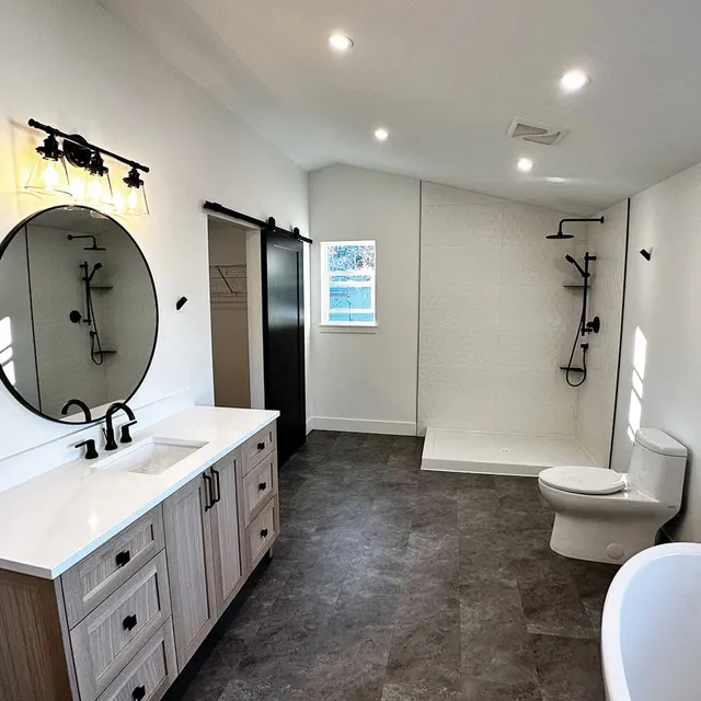 Renovated master bathroom by LDR Construction